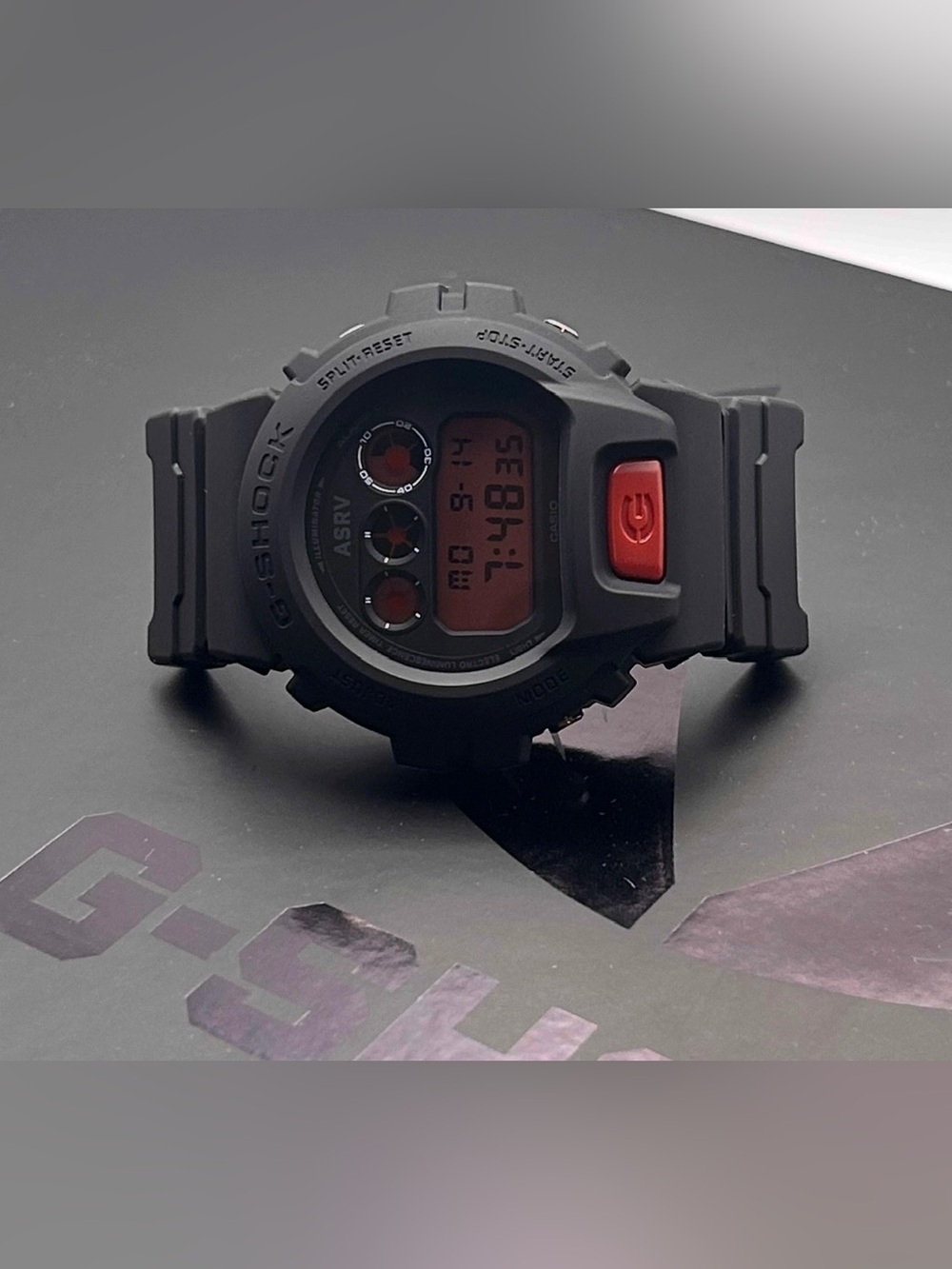 Casio G-Shock X ASRV DW6900 Men’s Red Dial Black Case Digital Quartz 50mm Watch
